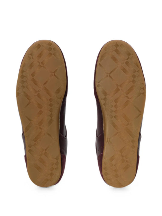 Close up of Burgundy shoes, showing detail