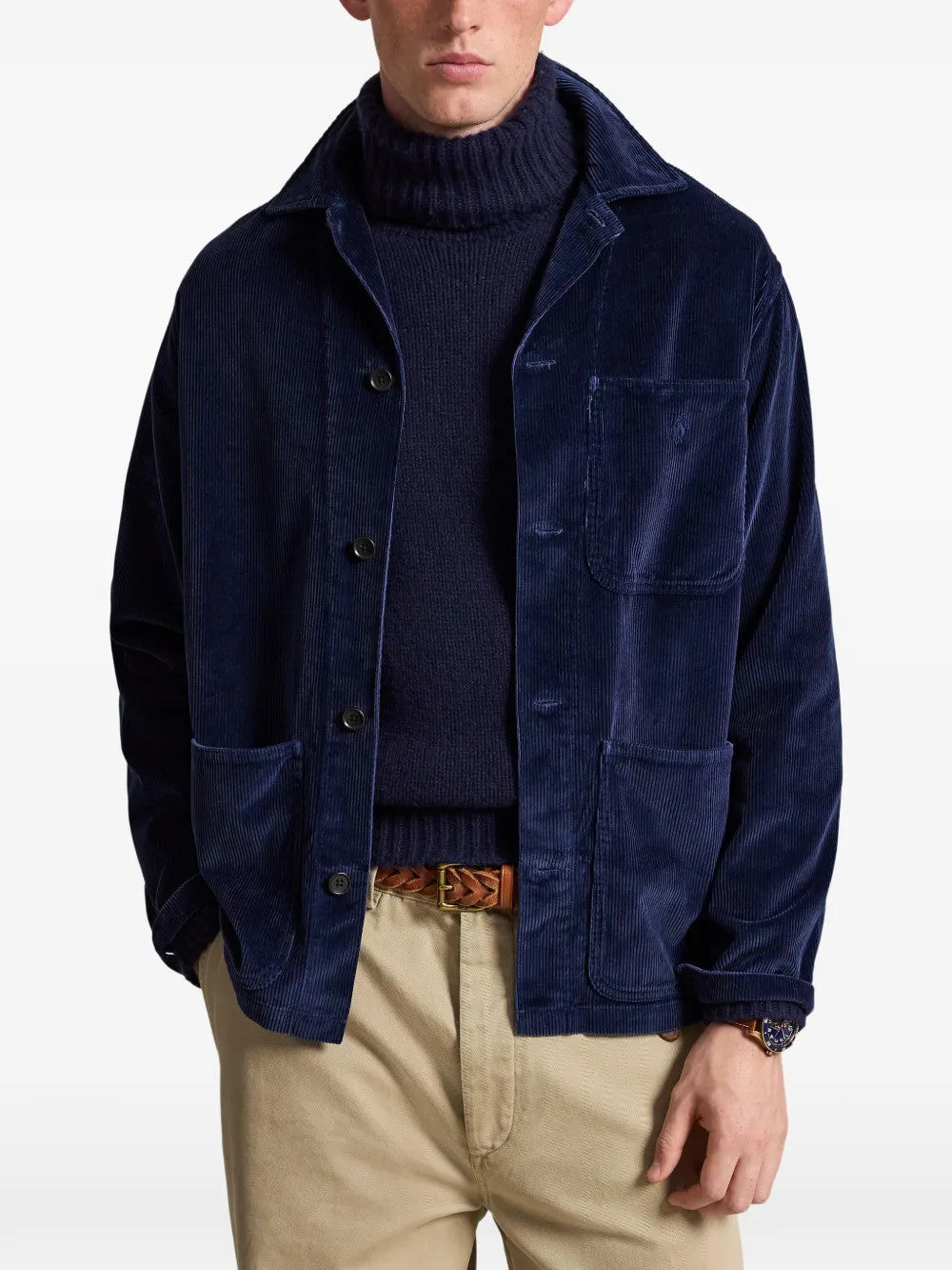 Navy jacket worn by a person, showing the jacket fit