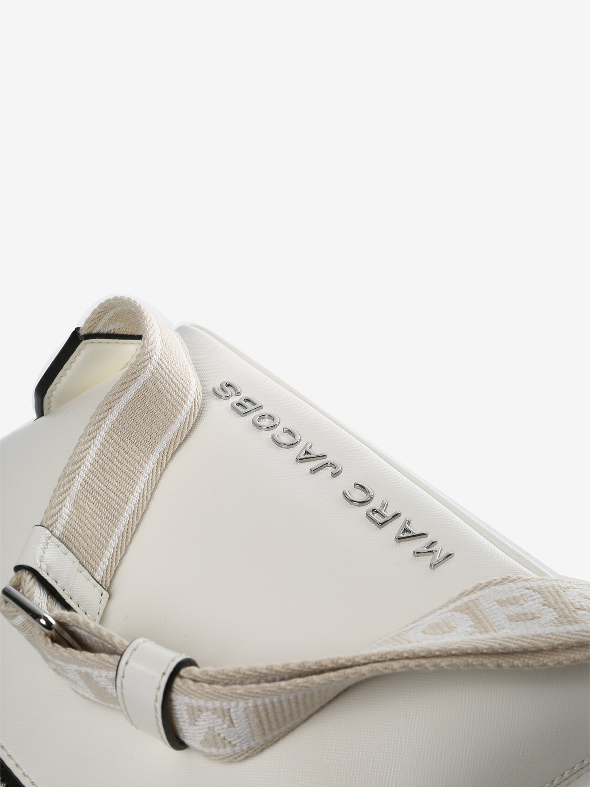 Close up of white bags, showing texture of the polyurethane fabric