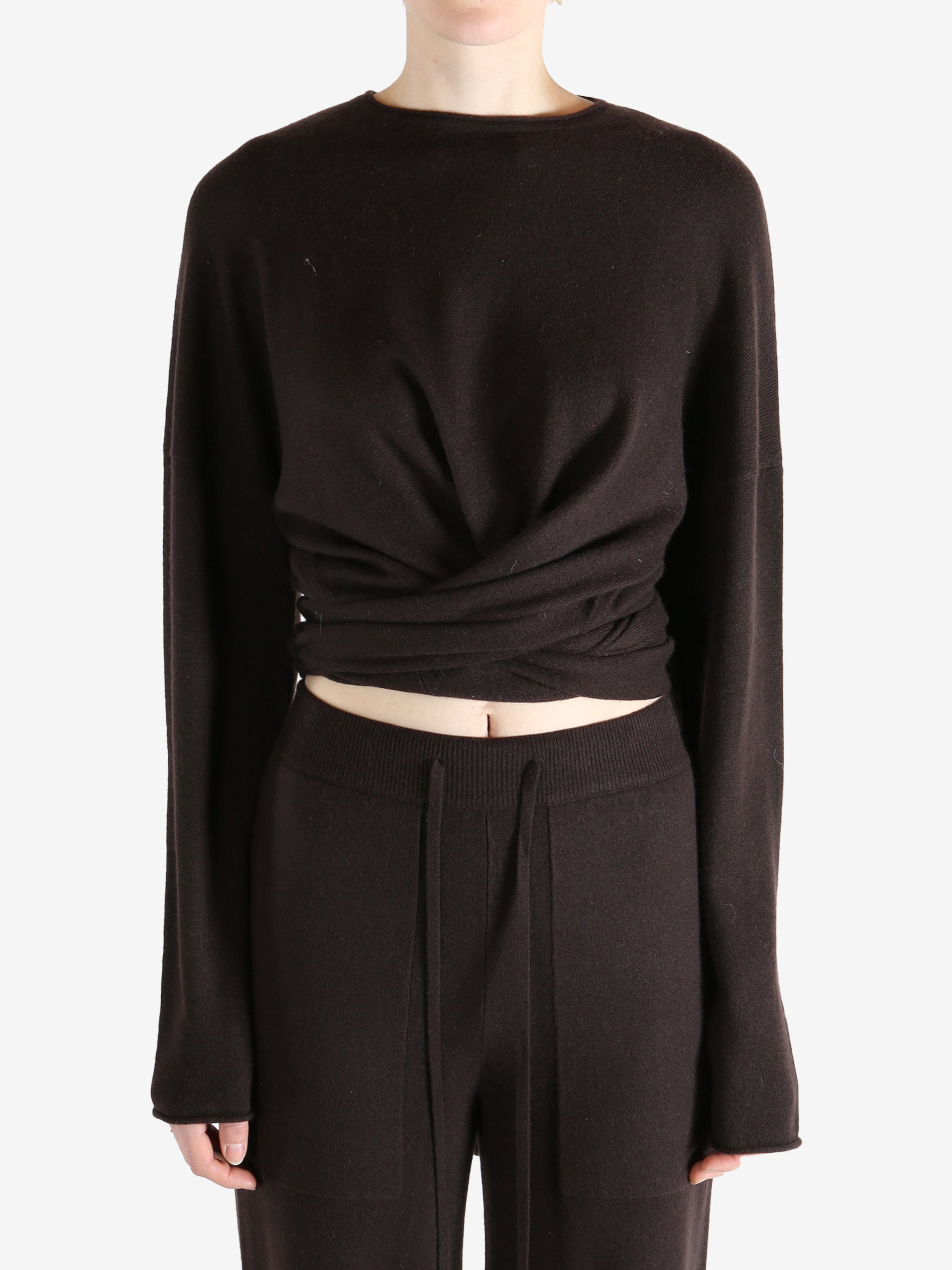 brown sweater worn by a person, showing the sweater fit