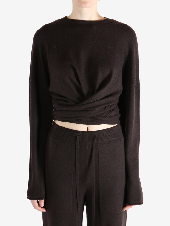 brown sweater worn by a person, showing the sweater fit