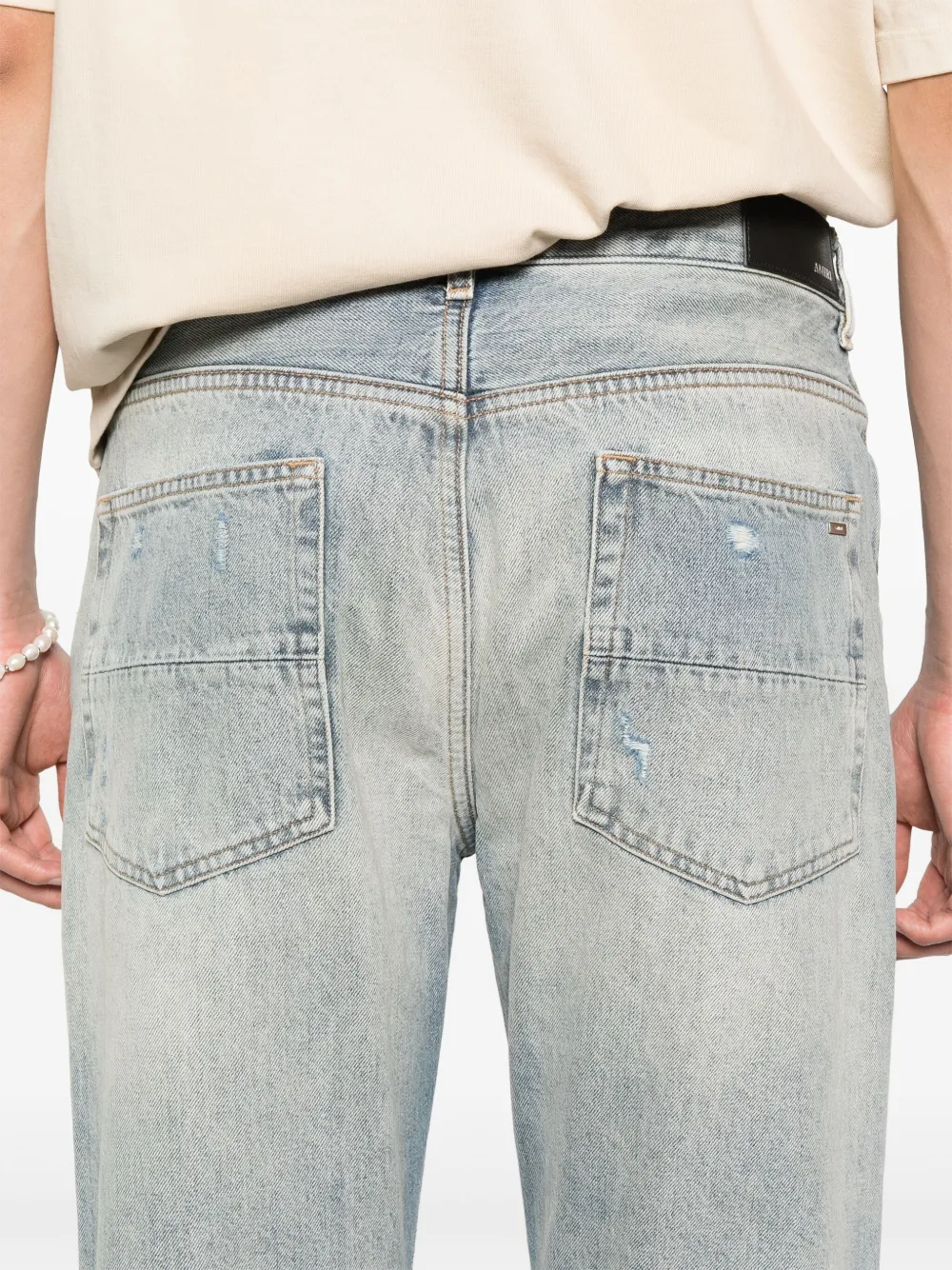 Close up of the blue jeans, showing texture of the cotton fabric