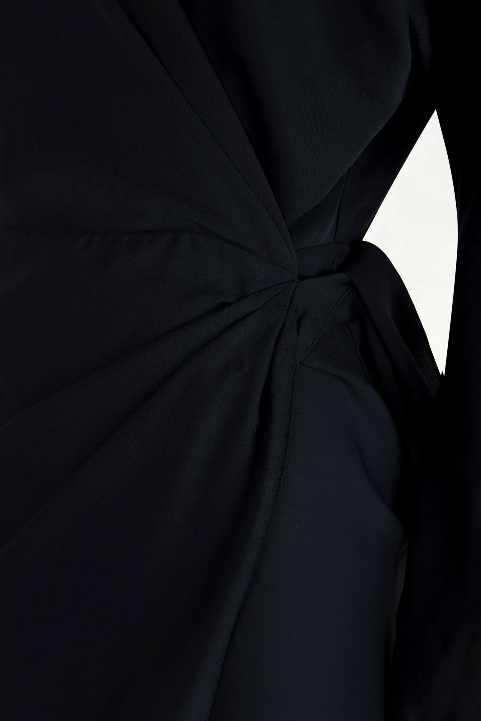 Close up of Navy dress, showing texture of the 100% silk fabric