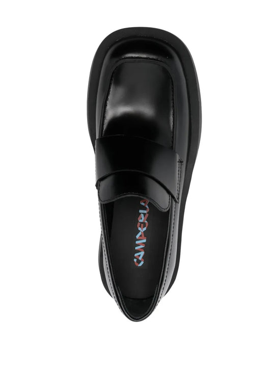 Black loafers, top view