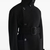 Black jacket worn by a person, showing the jacket fit