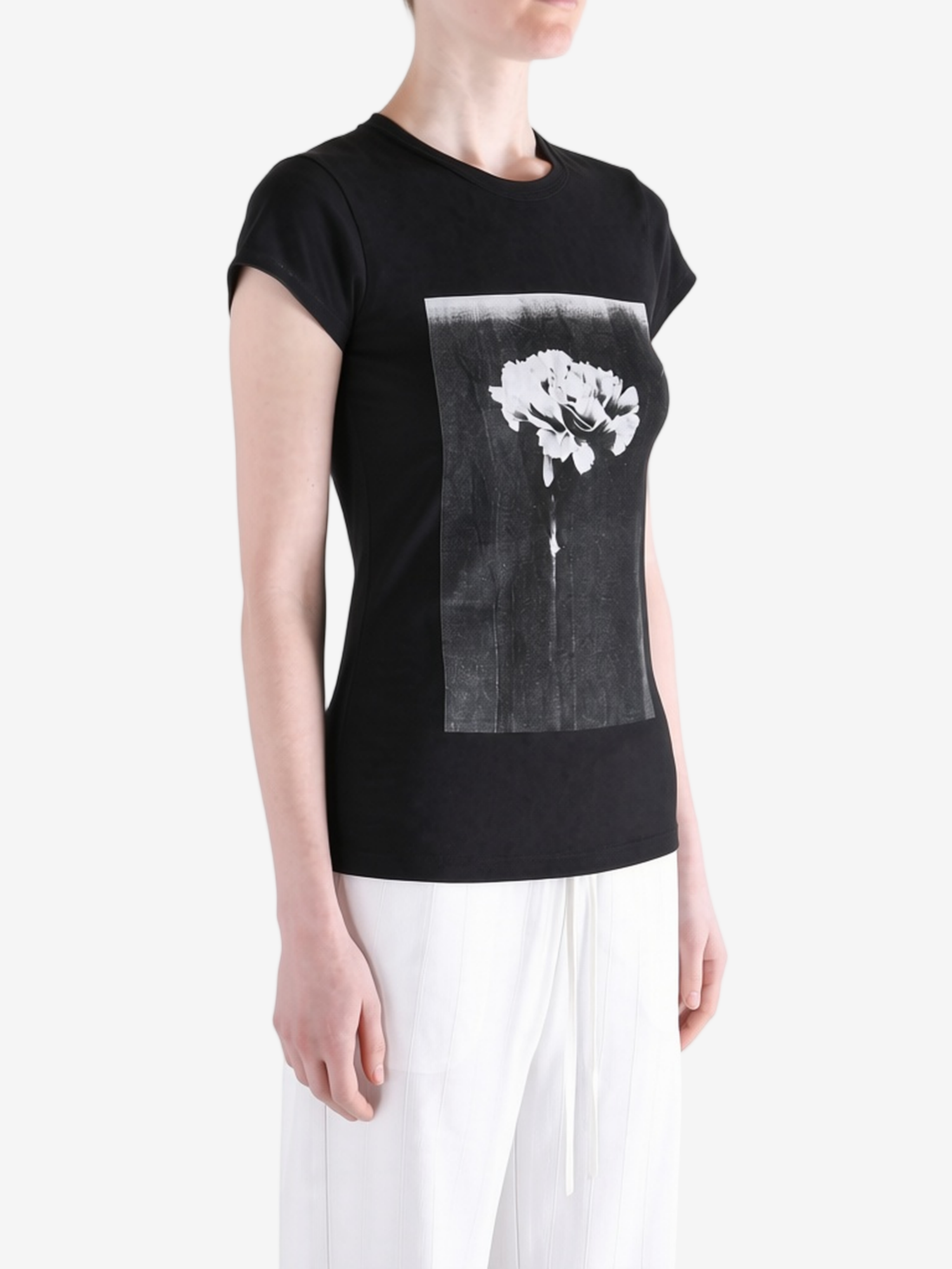 Black t-shirt worn by a person, showing the t-shirt fit