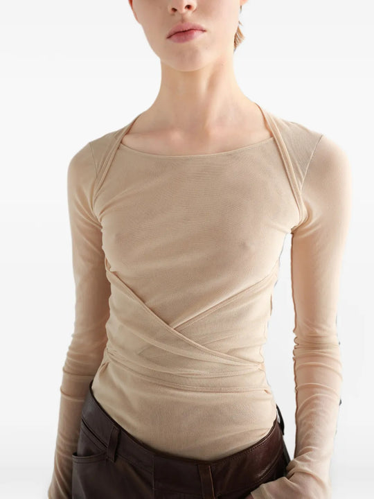 Tan top worn by a person, showing the top fit