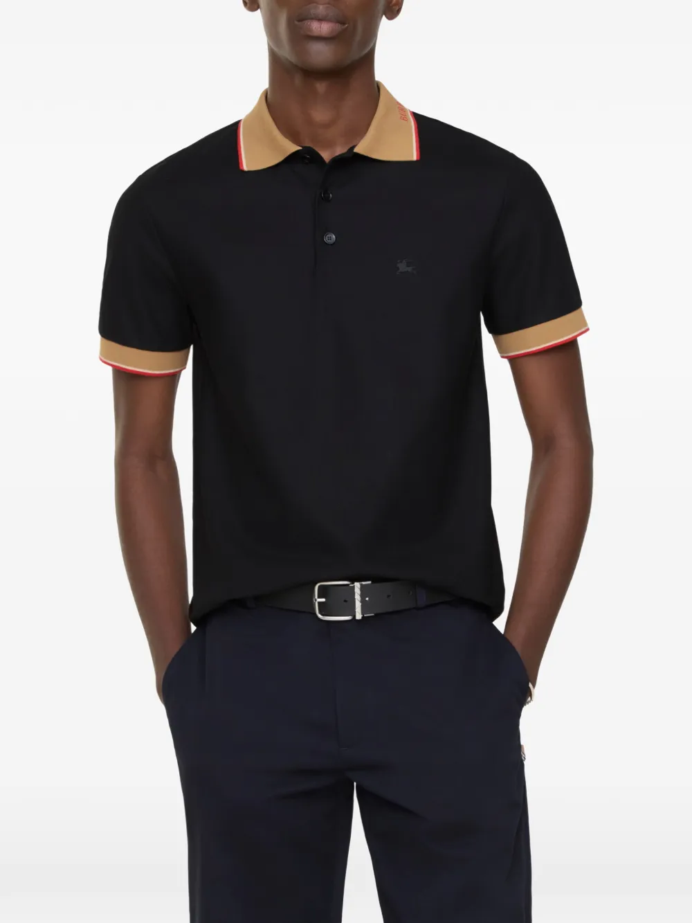 Blcak T-shirt worn by a person, showing the T-shirt's fit