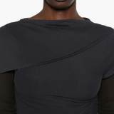 Close up of navy t-shirt, showing texture of the Organic Cotton fabric