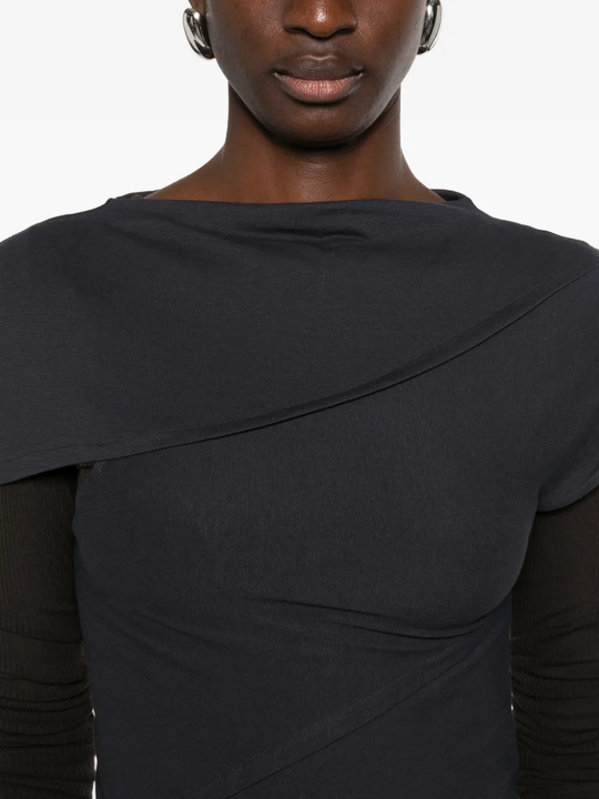 Close up of navy t-shirt, showing texture of the Organic Cotton fabric