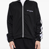 Black jacket worn by a person, showing the jacket fit