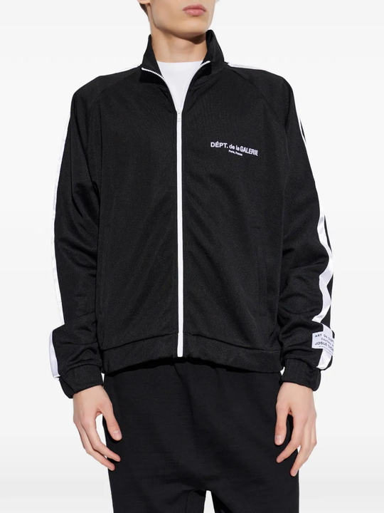 Black jacket worn by a person, showing the jacket fit