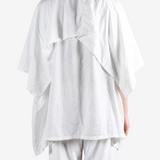 White top, full body view