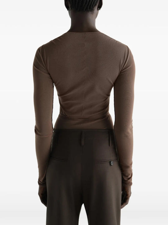 Brown top, full body view