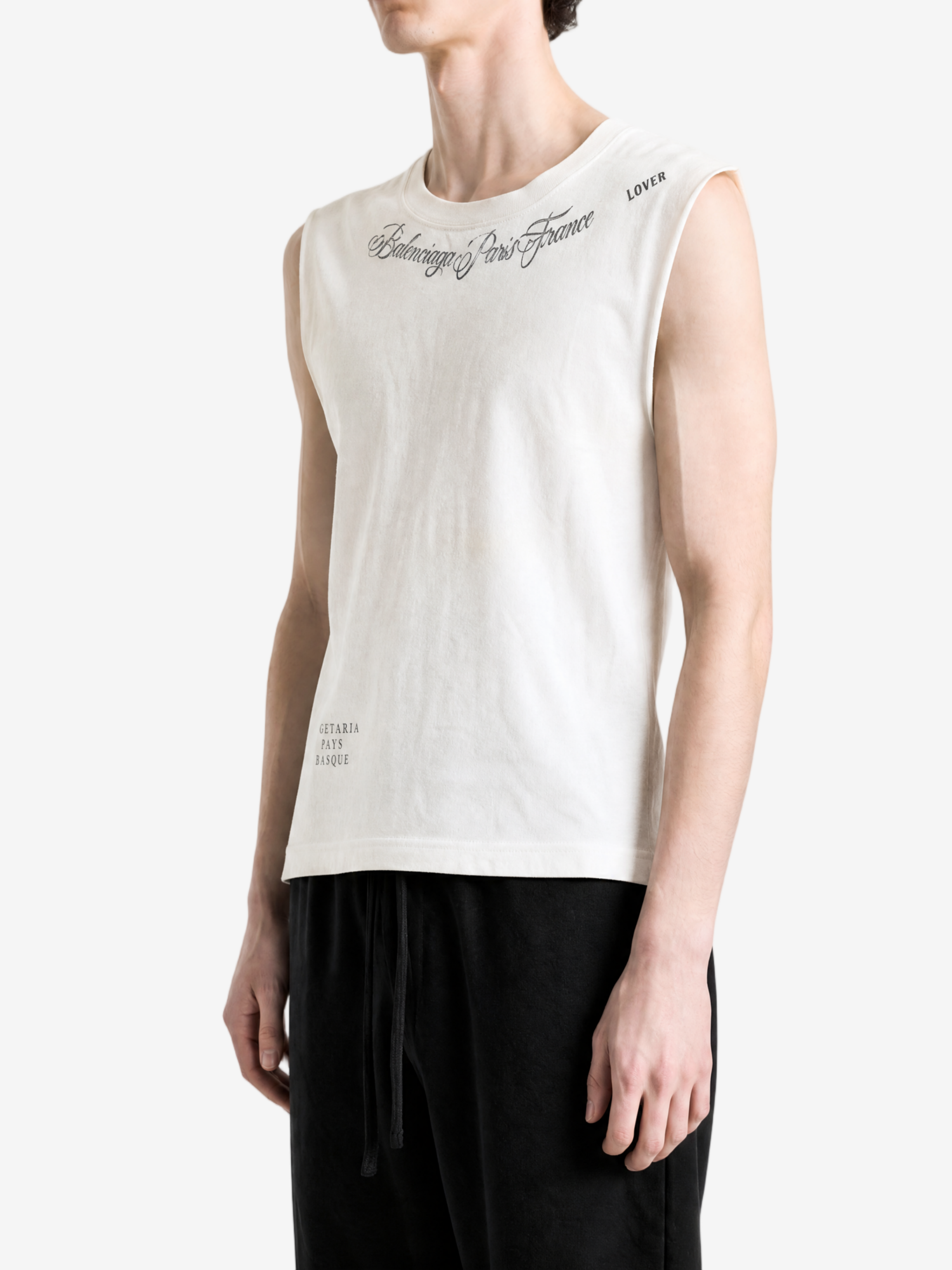 White t-shirt worn by a person, showing the t-shirt fit