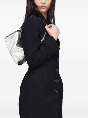 Grey bag worn by a person, showing the bag fit