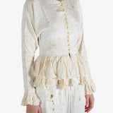 White tops worn by a person, showing the tops's fit