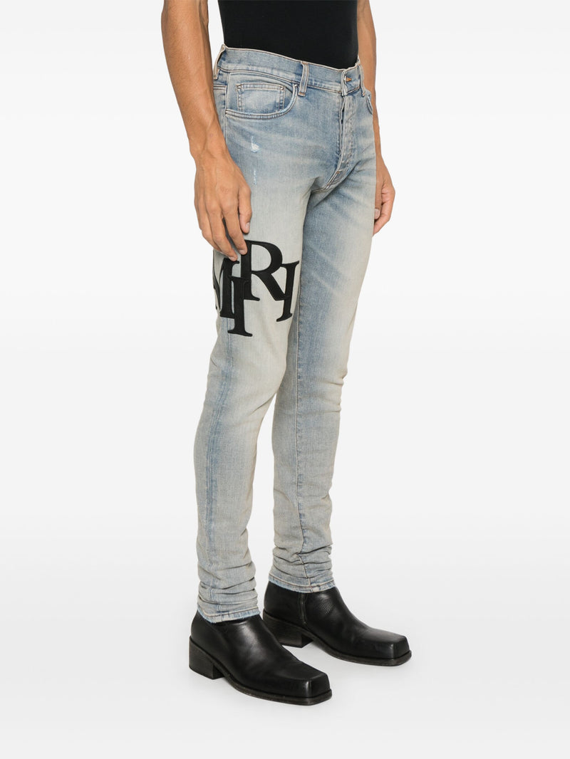 AMIRI - Men Staggered Logo Skinny Jean