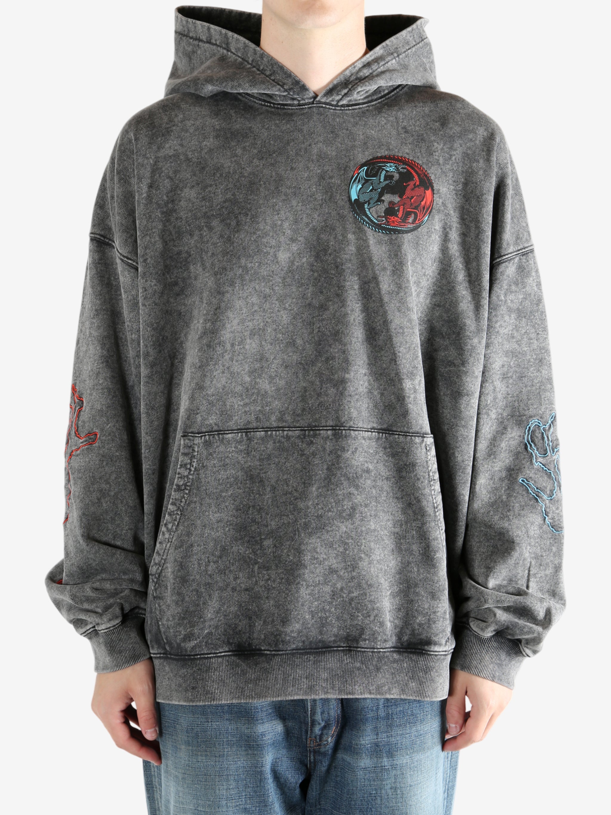 Black hoodie worn by a person, showing the hoodie's fit