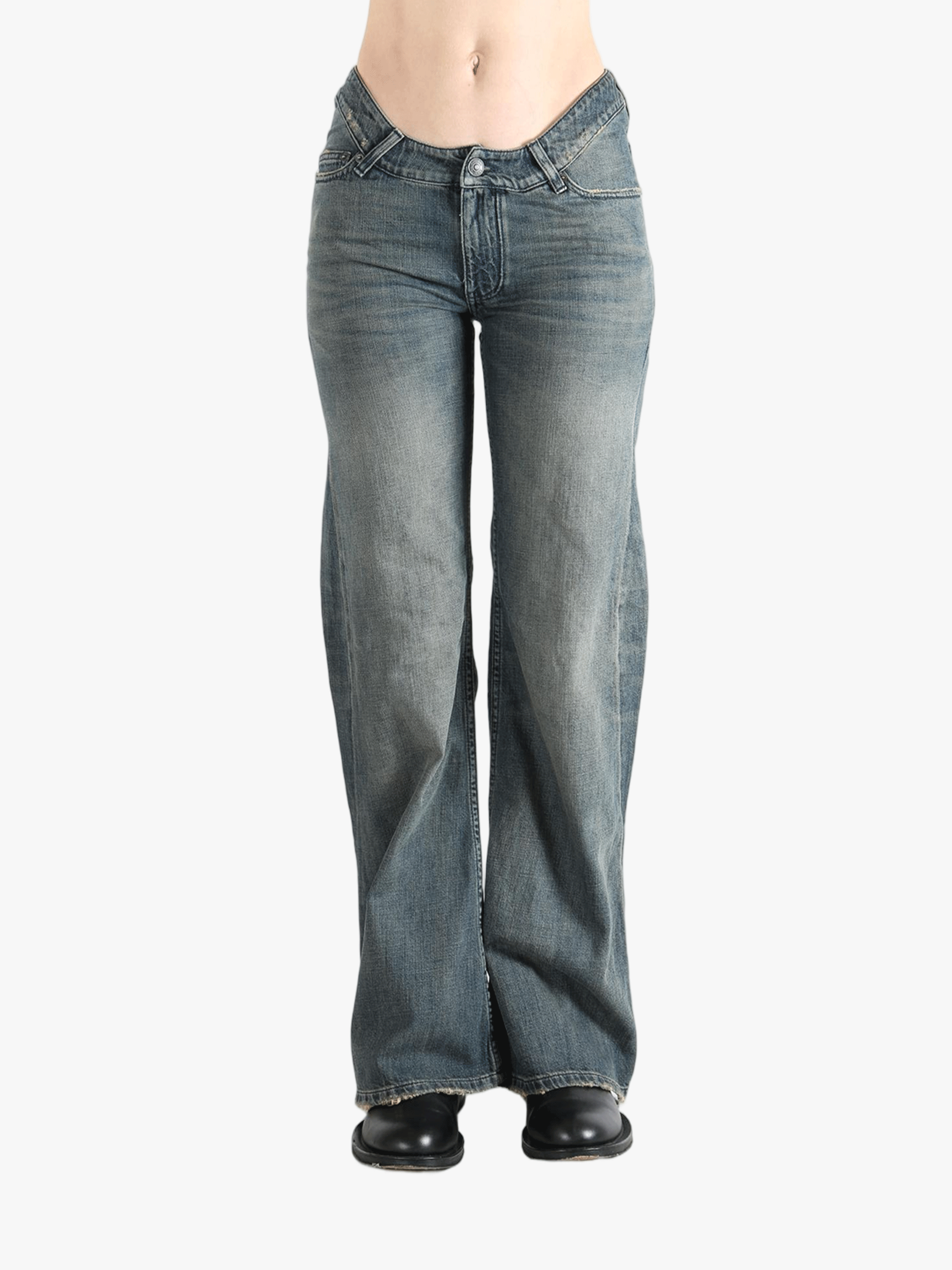 Blue jeans worn by a person,showing the jeans fit