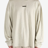 Tan tops worn by a person, showing the tops fit