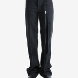 Black pants worn by a person, showing the pants' fit