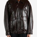 Brown jacket worn by a person, showing the jacket fit