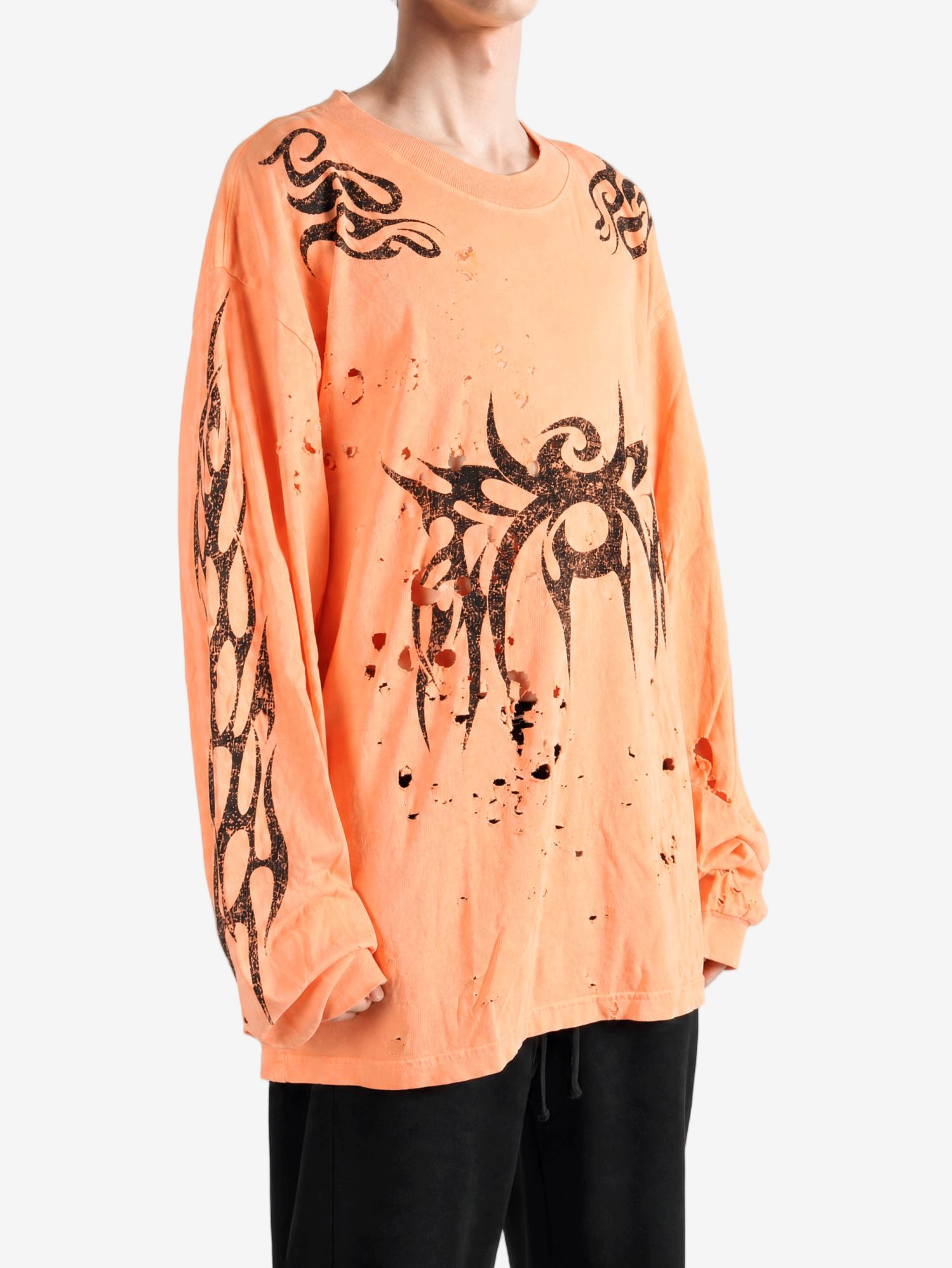 Orange t-shirt worn by a person, showing the t-shirt fit
