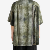 Green shirt, full body view