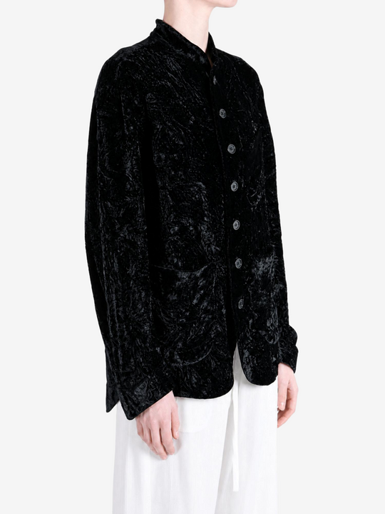 Black jacket worn by a person, showing the jacket fit
