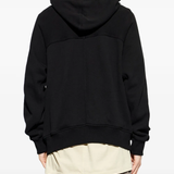 black Jacket worn by a person, showing the Jacket fit