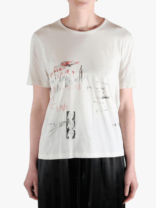 White shirt worn by a person, showing the shirt's fit