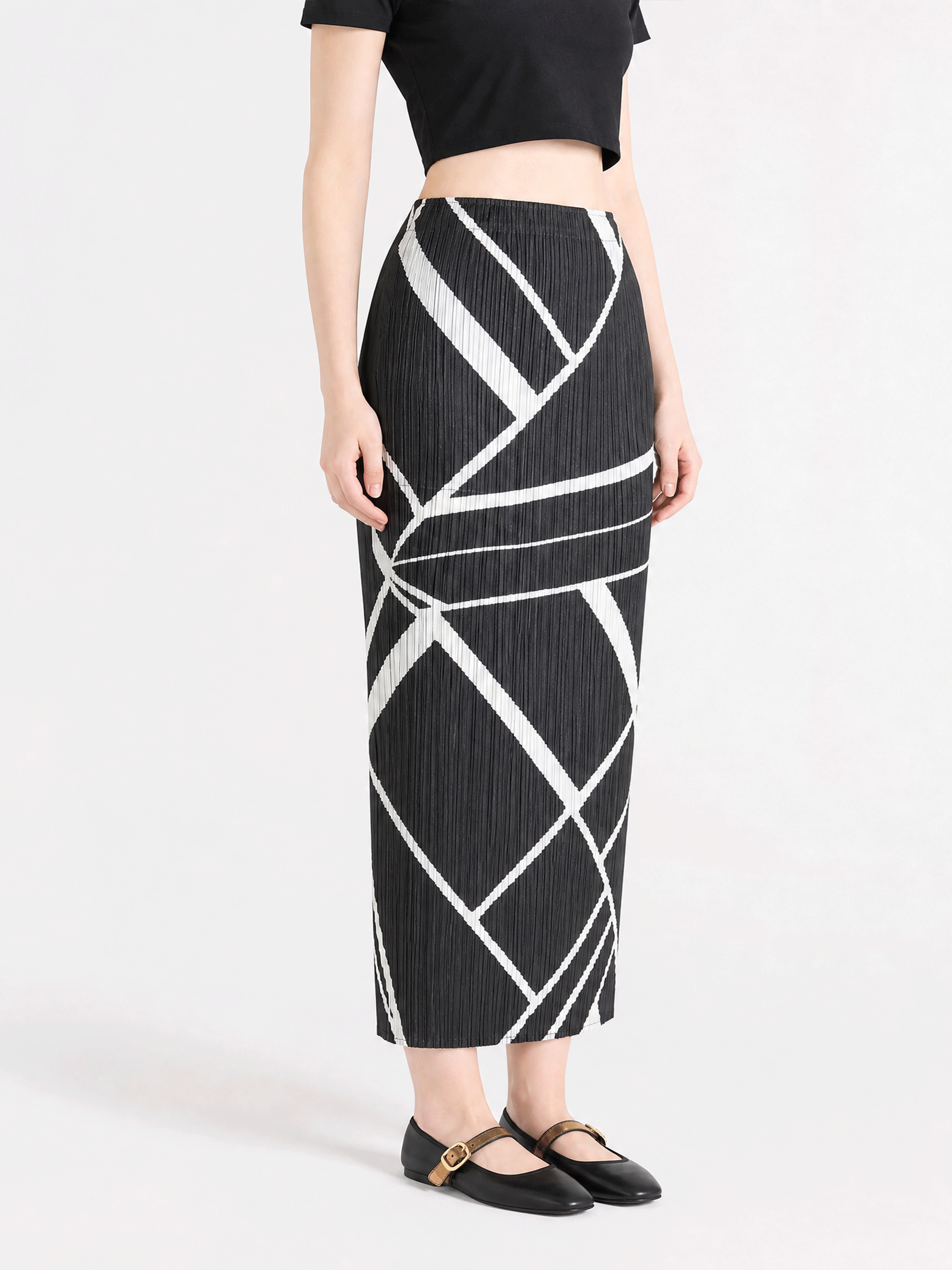 Black skirt worn by a person, showing the skirt fit