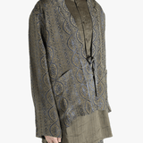 Blue jacket worn by a person, showing the jacket's fit