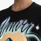 Black t-shirt worn by a person, showing the t-shirt fit