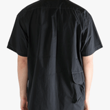 Black shirts worn by a person, showing the shirts fit