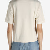 White shirt worn by a person, showing the shirt's fit