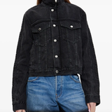 black jacket,worn by a person, showing the jacket fit