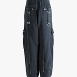 Black pants worn by a person, showing the pants' fit