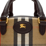 Close up of the brown bag, showing texture of the leather fabric