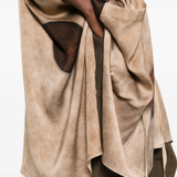 Brown top worn by a person, showing the top's fit