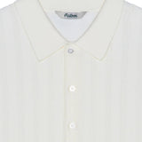 Close up of Tan shirt, showing texture of the 95% cotton/ 5% cashmere fabric