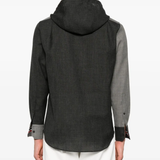 Grey sweater worn by a person, showing the sweater's fit