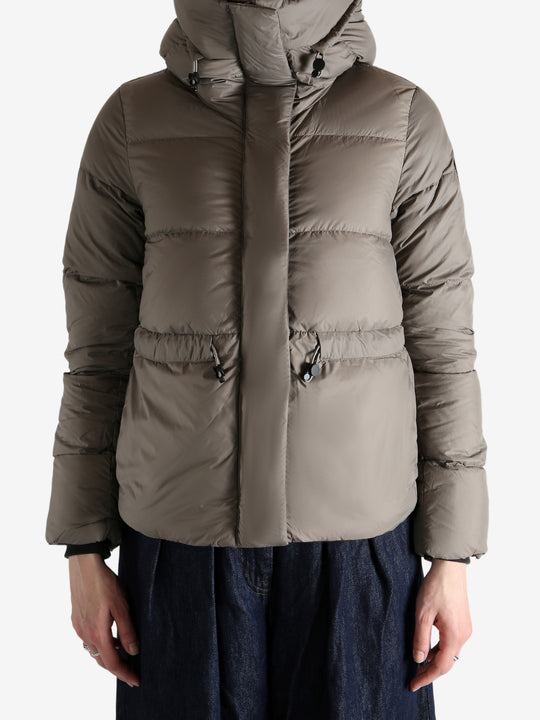 Grey jacket worn by a person, showing the jacket's fit
