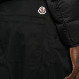 Black pants worn by a person, showing the pants fit