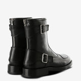 Black boots, back view