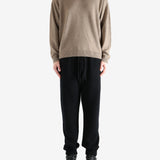 Brown knitwear, full body view