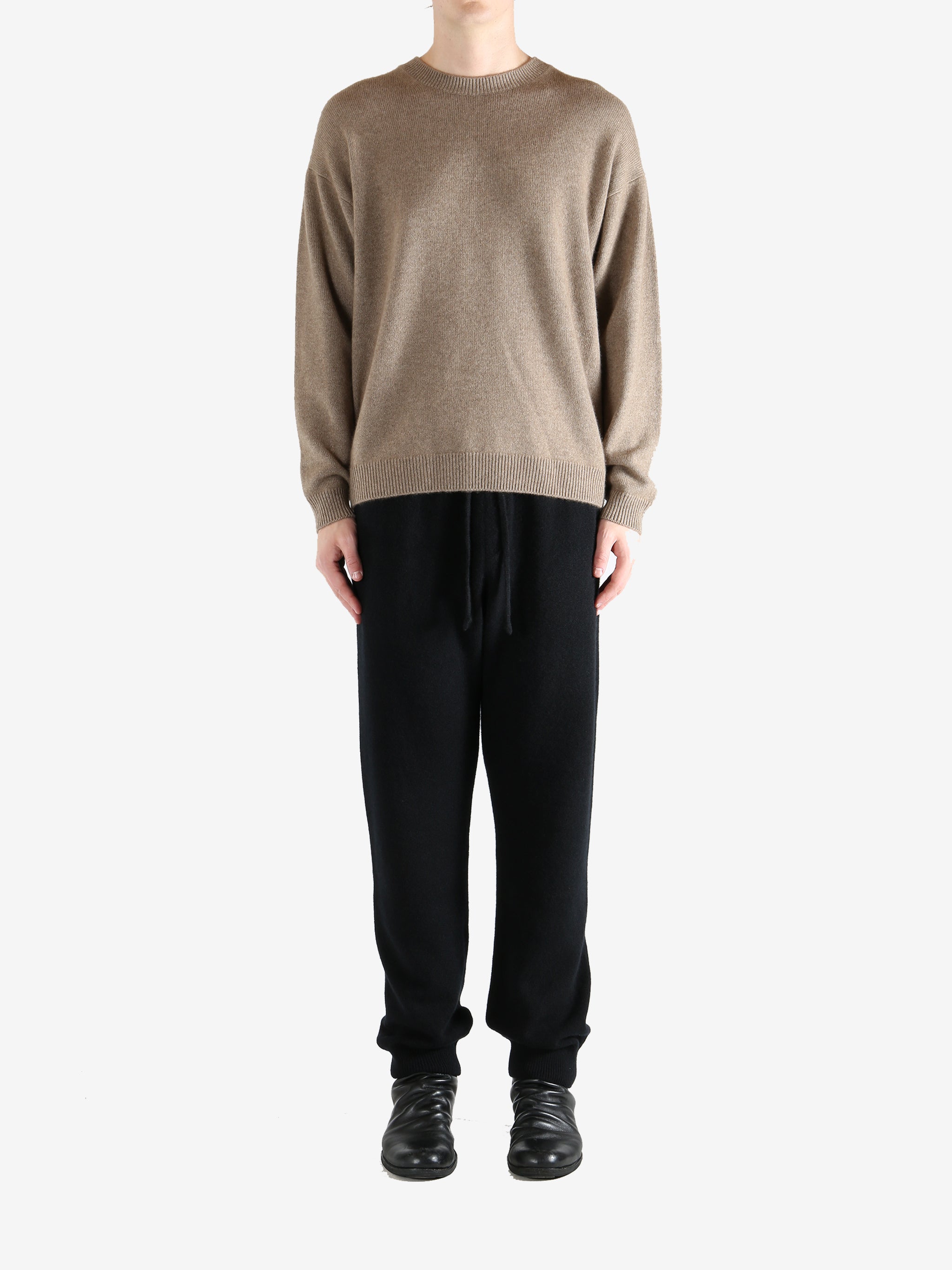 Brown knitwear, full body view