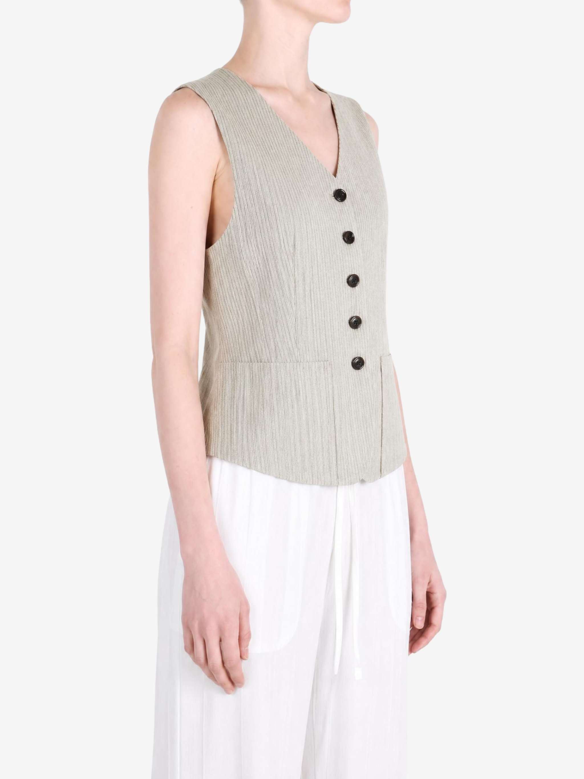 Tan top worn by a person, showing the top fit