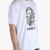 White t-shirt worn by a person, showing the t-shirt's fit